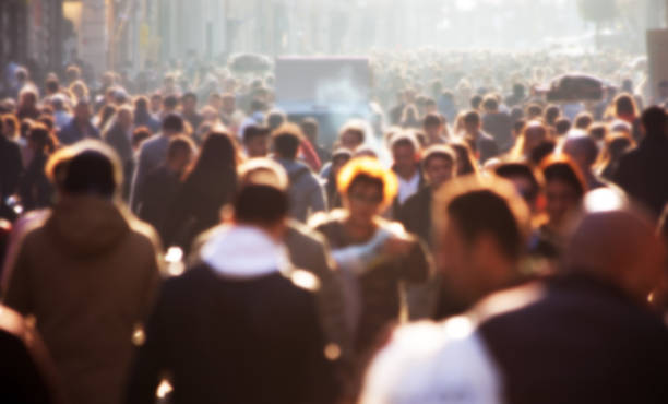 istock Blurred crowd of unrecognizable at the street 1077318556