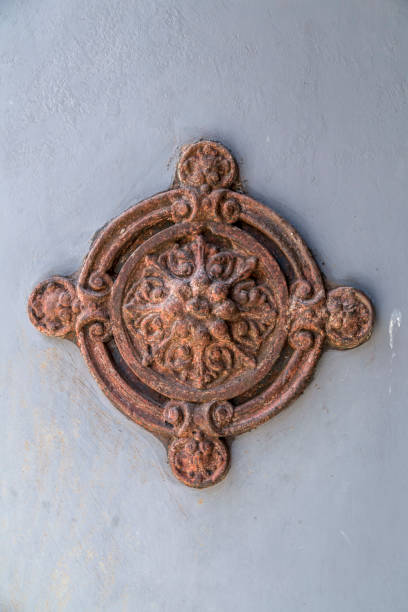 istock Antique rusty door ornament 1077318796