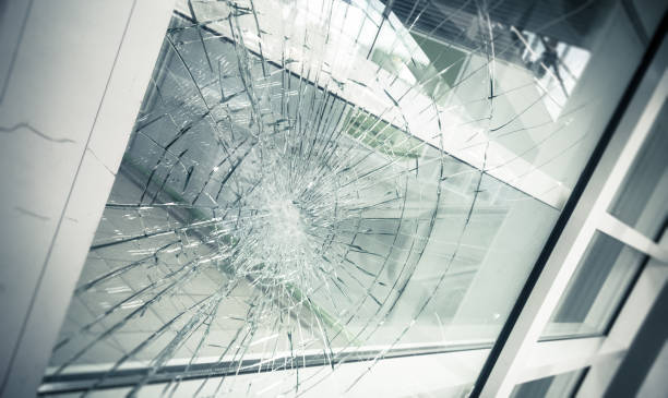 broken glass broken facade glass, close up breaking stock pictures, royalty-free photos & images
