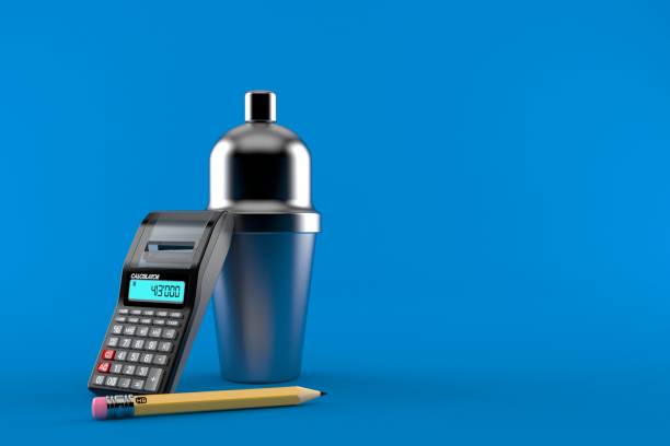 istock Cocktail shaker with calculator and pencil 1077336808