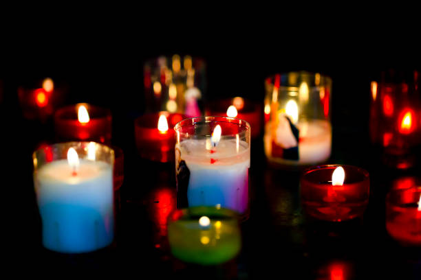 istock Candles in the church, dark background with copy space 1077341458