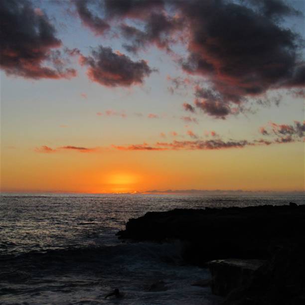 istock Sunset at Nanakuli Beach Park 12 01 2018, Nanakuli, Oahu, Hawaii 1077347924