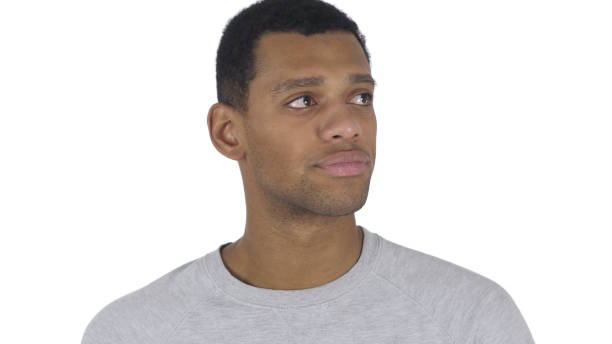 istock Afro-American Man Waiting and Watching Time, White Background 1077357688