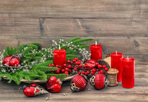 istock Christmas decorations burning candles Holidays background 1077360692