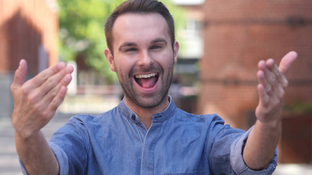 istock Inviting Gesture by Beard Adult Man 1077360930