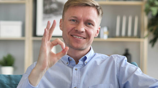 istock Okay Sign by Satisfied Businessman 1077363436