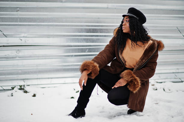 istock African american woman in winter 1077363492