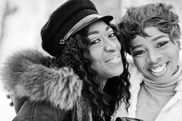 istock Two african american womans in winter 1077363952