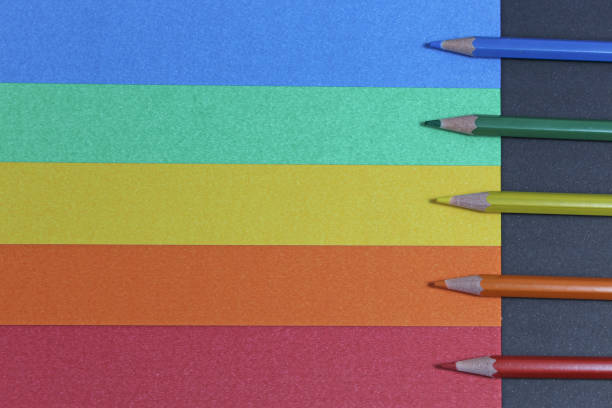 istock Background of colored pencils and colored paper 1077389908