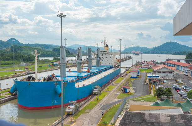 istock Cargo ship passes through lift locks of the Panama Canal. 1077397266
