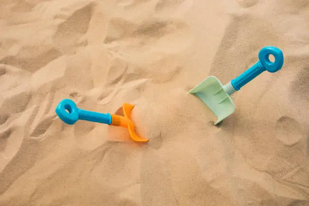 Shovel toy on sand,beach summer and vacation concepts with kid