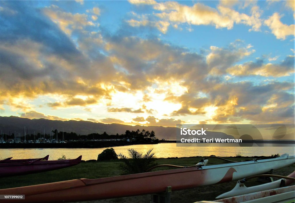 Sunset from Haleiwa Beach Park, 12/02/2018  North Shore, Haleiwa, Oahu, Hawaii Sunset from Haleiwa Beach Park on 12/02/2018  North Shore, Haleiwa, Oahu, Hawaii  Sunsets can be seen from this NW corner of Oahu most of the year.  Clouds always provide a more dramatic sky during sunsets. Haleiwa Stock Photo