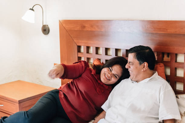 istock Senior Couple in Mexican Hotel Room 1077408976
