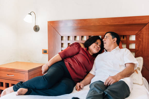 istock Senior Couple in Mexican Hotel Room 1077409636