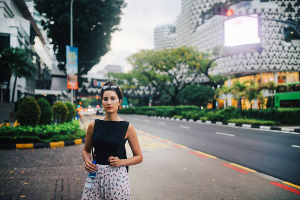 istock Young woman traveller in Singapore 1077409640
