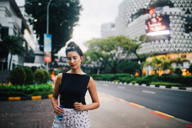 istock Young woman traveller in Singapore 1077409828