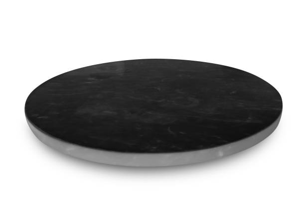 istock Black marble plate isolated on white background. 1077411476