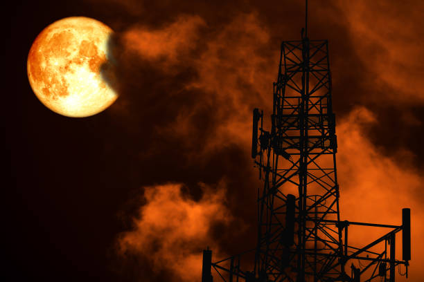 istock blood moon back silhouette Antenna and night red cloud on sky 1077415728