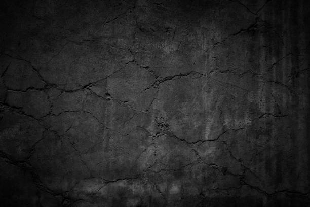 istock Crack black background. Grunge texture. Dark wallpaper. Blackboard. Chalkboard 1077441108