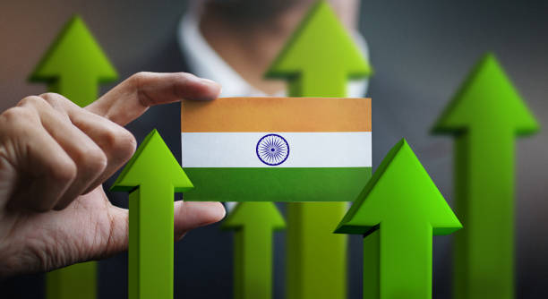 Nation Growth Concept, Green Up Arrows - Businessman Holding Card of India Flag Nation Growth Concept, Green Up Arrows - Businessman Holding Card of India Flag india stock pictures, royalty-free photos & images