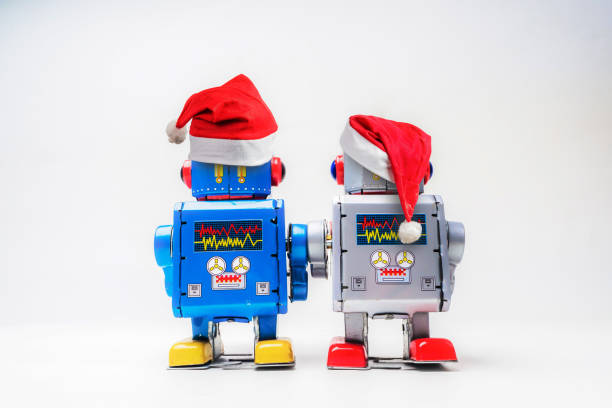 istock Vintage robot retro classic toy with Christmas hat on white background . 1077467106