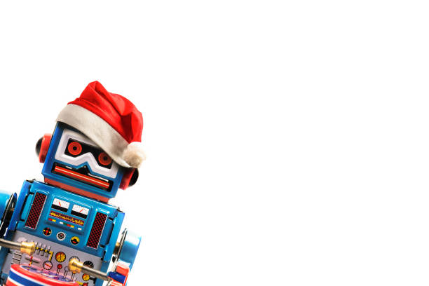 istock Vintage robot retro classic toy with Christmas hat on white background . 1077467134