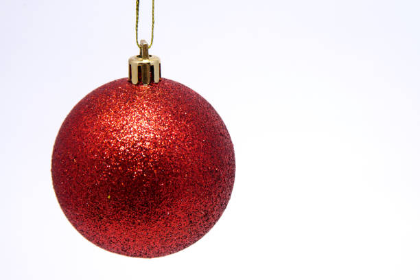 istock Christmas ball red on white background close-up 1077478000