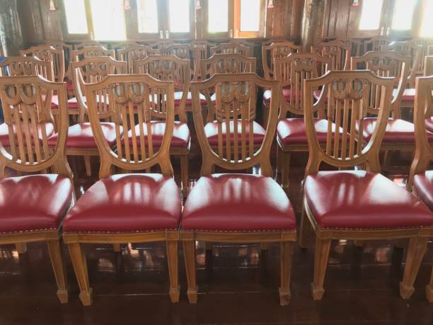 istock Row of red sofa chair for resting 1077484512