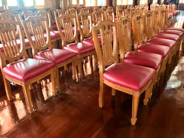 istock Row of red sofa chair for resting 1077484522