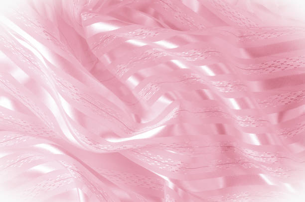 istock Background texture, pattern. Pink silk fabric with a light stripe. A smooth elegant pink silk or satin texture can be used as a background. Trend of color rose quartz pink pastel tone 1077486136