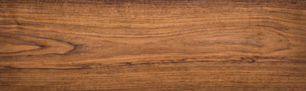 istock Walnut wood texture. Super long walnut planks texture background. 1077486660