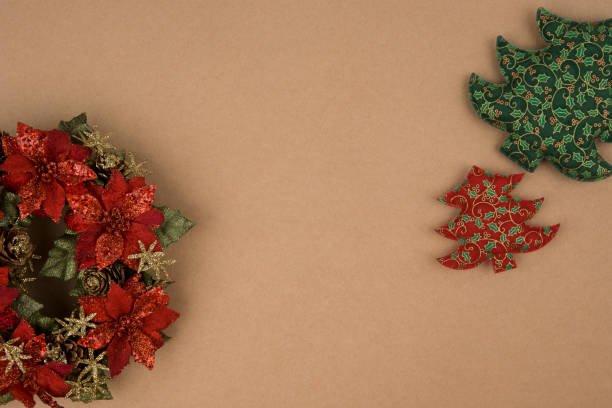istock Christmas wreath on brown paper 1077488232