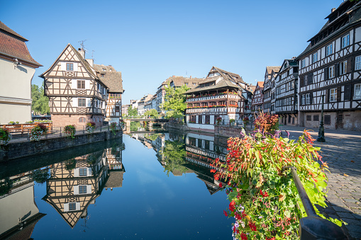 Perfect reflection on the canal in Strasbourg old town city center in Summer