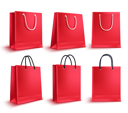 Shopping bags vector set. Red sale empty paper bags collection for fashion shopping design elements isolated in white. Vector illustration.