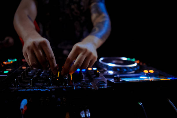 istock Dj playing disco house progressive electro music at the concert 1077494246