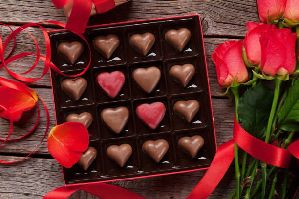 istock Valentines day with red roses and chocolate 1077494412