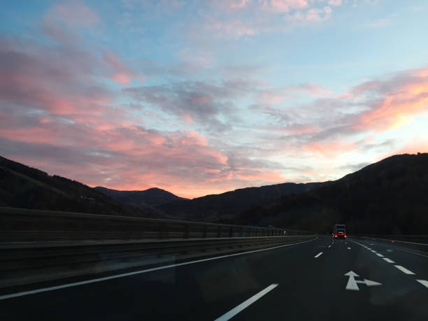 istock Highway with sunset in Switzerland. Alps. 1077496966