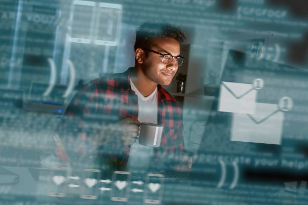 istock Young indian man received message from dating app 1077503934