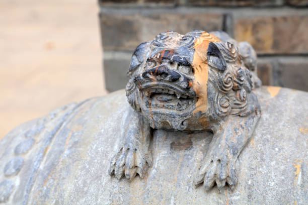 istock stone lion in a park 1077504210