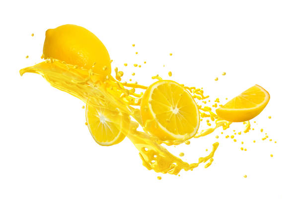 istock Juice or liquid splashing with yellow lemon isolated on white background. Creative minimalistic food concept for design package, advertising, ads, branding. 1077506548