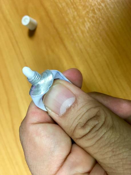 istock Squeeze the wound from the tube by hand. 1077507850