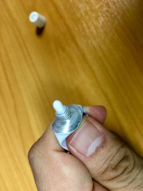 istock Squeeze the wound from the tube by hand. 1077507896