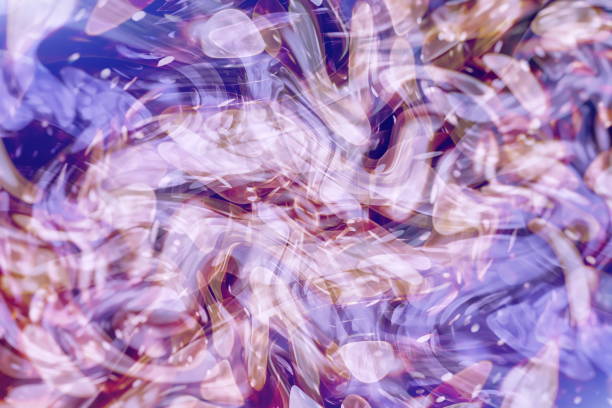 istock abstract blurred of blue and silver glittering shine bulbs lights background:blur of Christmas wallpaper decorations concept.xmas holiday festival backdrop:sparkle circle lit celebrations display. 1077508604