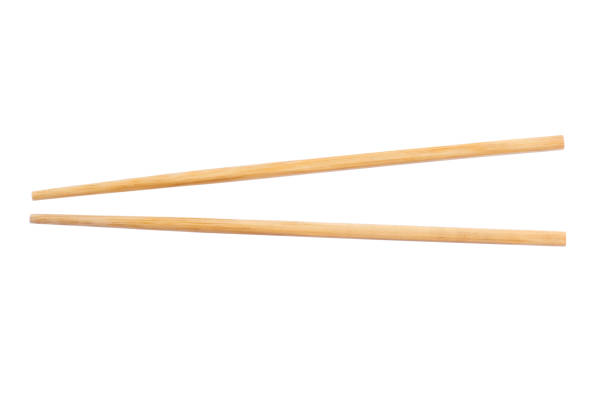 istock Wooden chopsticks on white background. 1077509818