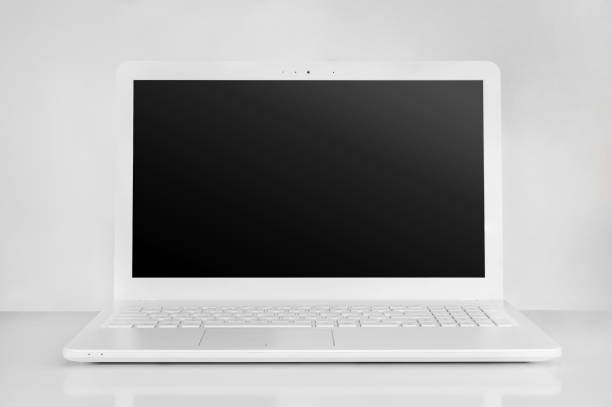 istock totally white laptop with black screen. pure workspace concept 1077510552
