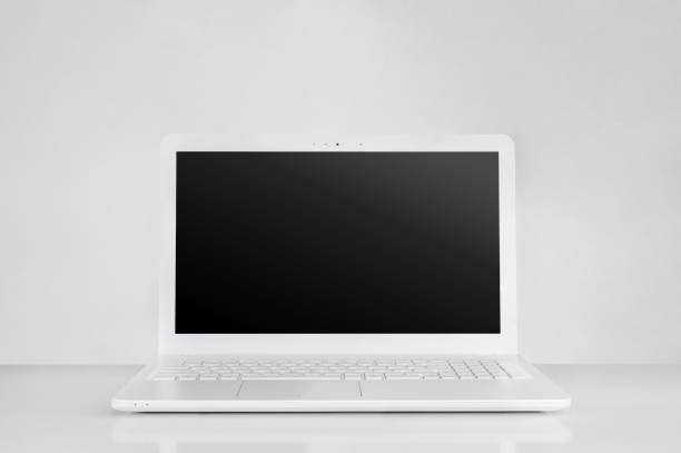 istock totally white laptop with black screen. pure workspace concept 1077510564