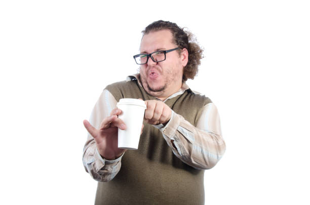 istock Coffee and nasty taste. Funny fat man. 1077515254