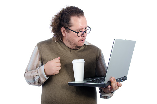 Cheerful big man posing in the studio. White background.