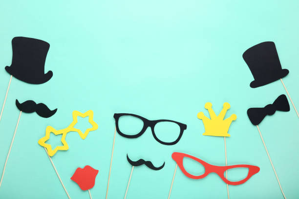 istock Paper booth props for party on mint background 1077517614