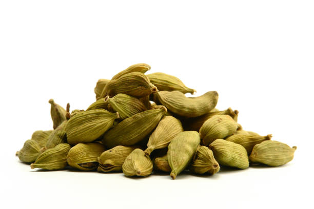 Green Cardamom Spice Green cardamom spice on white background Cardamom stock pictures, royalty-free photos & images